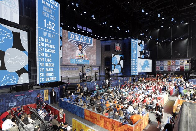 Fans attend the final day of the NFL football draft Saturday, April 27, 2019, in Nashville, Tenn. (AP Photo/Mark Humphrey)