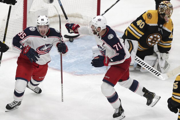 Columbus Blue Jackets center Matt Duchene, left, celebrates with Nick Foligno (71) after his game-winning goal against Boston Bruins goaltender Tuukka Rask (40) during double overtime of Game 2 of an NHL hockey second-round playoff series, early Sunday, April 28, 2019, in Boston. The Blue Jackets won 3-2. (AP Photo/Charles Krupa)