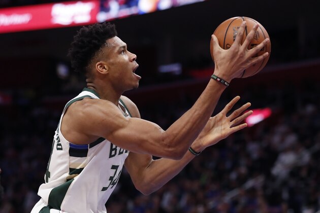 Milwaukee Bucks forward Giannis Antetokounmpo makes a layup during the first half of Game 4 of a first-round NBA basketball playoff series against the Detroit Pistons, Monday, April 22, 2019, in Detroit. (AP Photo/Carlos Osorio)