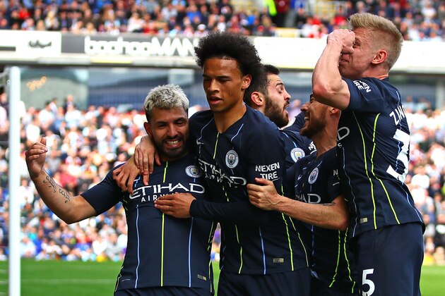 BURNLEY, ENGLAND - APRIL 28: Sergio Aguero of Manchester City is congratulated by his team-mates after scoring the opening goal during the Premier League match between Burnley FC and Manchester City at Turf Moor on April 28, 2019 in Burnley, United Kingdom. (Photo by Chris Brunskill/Fantasista/Getty Images)
