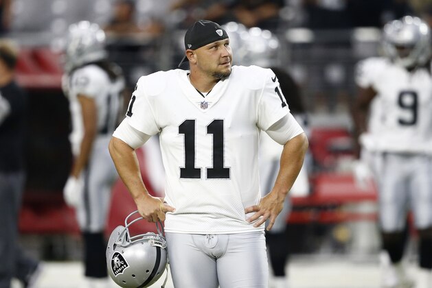 Oakland Raiders kicker Sebastian Janikowski watches pre game prior to an NFL preseason football game, Saturday, Aug. 12, 2017, in Glendale, Ariz. (AP Photo/Ross D. Franklin)