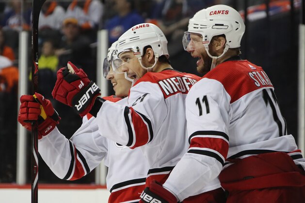 NEW YORK, NEW YORK - APRIL 28:  Nino Niederreiter #21 of the Carolina Hurricanes (c) celebrates his goal at 1:05 of the third period against the New York Islanders in Game Two of the Eastern Conference Second Round during the 2019 NHL Stanley Cup Playoffs at the Barclays Center on April 28, 2019 in the Brooklyn borough of New York City. (Photo by Bruce Bennett/Getty Images)
