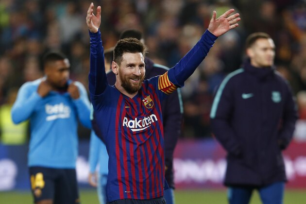 Barcelona's Argentinian forward Lionel Messi celebrates after Barcelona won their 26th league title at the end of the Spanish League football match between Barcelona and Levante at the Camp Nou stadium in Barcelona on April 27, 2019. (Photo by PAU BARRENA / AFP)        (Photo credit should read PAU BARRENA/AFP/Getty Images)
