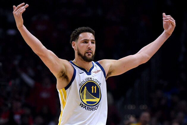 LOS ANGELES, CALIFORNIA - APRIL 26:  Klay Thompson #11 of the Golden State Warriors celebrates an offensive foul by Montrezl Harrell #5 of the LA Clippers in the first half during Game Six of Round One of the 2019 NBA Playoffs at Staples Center on April 26, 2019 in Los Angeles, California. (Photo by Harry How/Getty Images)  NOTE TO USER: User expressly acknowledges and agrees that, by downloading and or using this photograph, User is consenting to the terms and conditions of the Getty Images License Agreement.