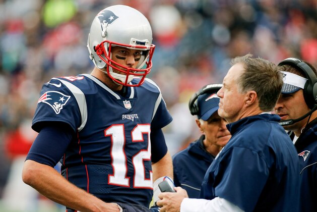 FOXBORO, MA - OCTOBER 29:  Head coach Bill Belichick of the New England Patriots talks with Tom Brady #12 during the fourth quarter of a game against the Los Angeles Chargers at Gillette Stadium on October 29, 2017 in Foxboro, Massachusetts.  (Photo by Jim Rogash/Getty Images)