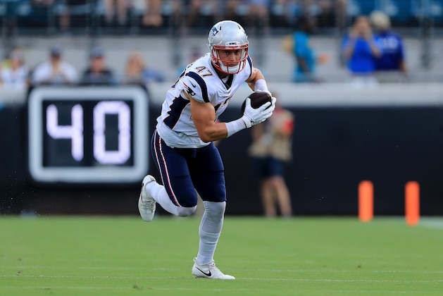 JACKSONVILLE, FL - SEPTEMBER 16:  Jacob Hollister #47 of the New England Patriots rushes for yardage during the game against the Jacksonville Jaguars at TIAA Bank Field on September 16, 2018 in Jacksonville, Florida.  (Photo by Sam Greenwood/Getty Images)