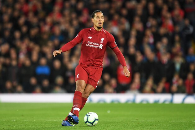 LIVERPOOL, ENGLAND - APRIL 26:  Virgil van Dijk of Liverpool in action during the Premier League match between Liverpool FC and Huddersfield Town at Anfield on April 26, 2019 in Liverpool, United Kingdom. (Photo by Michael Regan/Getty Images)