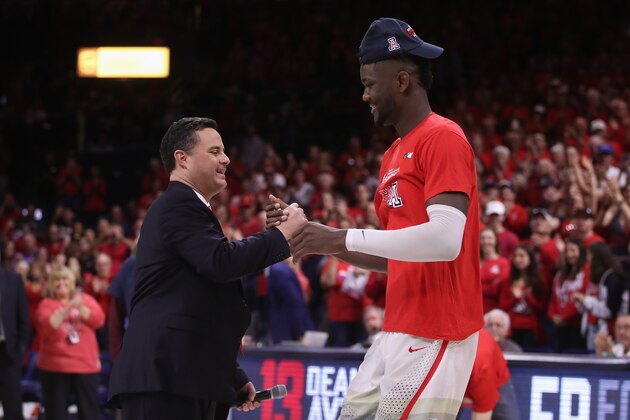 TUCSON, AZ - MARCH 03:  Head coach Sean Miller of the Arizona Wildcats greets Deandre Ayton #13 after defeating the California Golden Bears 66-54 to win the PAC-12 Championship at McKale Center on March 3, 2018 in Tucson, Arizona.  (Photo by Christian Petersen/Getty Images)