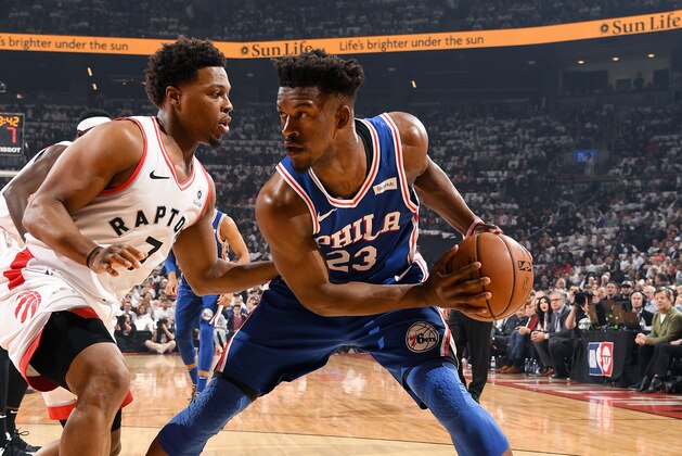 TORONTO, CANADA - APRIL 29: Jimmy Butler #23 of the Philadelphia 76ers handles the ball against the Toronto Raptors during Game Two of the Eastern Conference Semifinals of the 2019 NBA Playoffs on April 29, 2019 at Scotiabank Arena in Toronto, Ontario, Canada. NOTE TO USER: User expressly acknowledges and agrees that, by downloading and/or using this photograph, user is consenting to the terms and conditions of the Getty Images License Agreement. Mandatory Copyright Notice: Copyright 2019 NBAE (Photo by Ron Turenne/NBAE via Getty Images)