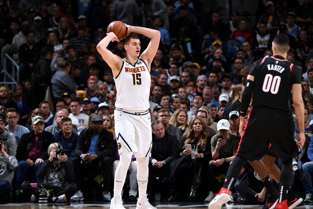 DENVER, CO - APRIL 29: Nikola Jokic #15 of the Denver Nuggets looks to pass against the Portland Trail Blazers during Game One of the Western Conference Semifinals of the 2019 NBA Playoffs on April 29, 2019 at the Pepsi Center in Denver, Colorado. NOTE TO USER: User expressly acknowledges and agrees that, by downloading and/or using this photograph, user is consenting to the terms and conditions of the Getty Images License Agreement. Mandatory Copyright Notice: Copyright 2019 NBAE (Photo by Garrett Ellwood/NBAE via Getty Images)