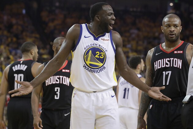 Golden State Warriors forward Draymond Green (23) gestures toward referee Zach Zarba next to Houston Rockets forward PJ Tucker (17) during the first half of Game 1 of a second-round NBA basketball playoff series in Oakland, Calif., Sunday, April 28, 2019. (AP Photo/Jeff Chiu)
