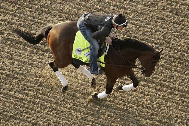 Kentucky Derby hopeful Omaha Beach is ridden during a workout at Churchill Downs Monday, April 29, 2019, in Louisville, Ky. The 145th running of the Kentucky Derby is scheduled for Saturday, May 4. (AP Photo/Charlie Riedel)