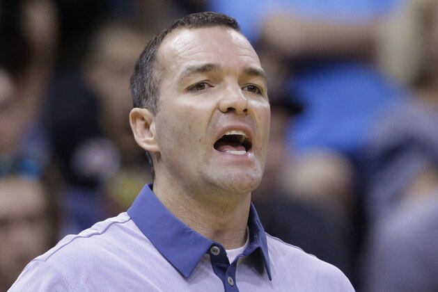 Utah Jazz summer league head coach Alex Jensen shouts to his team during the second half of an NBA summer league basketball game against the San Antonio Spurs Tuesday, July 7, 2015, in Salt Lake City. The Jazz won 72-70. (AP Photo/Rick Bowmer)