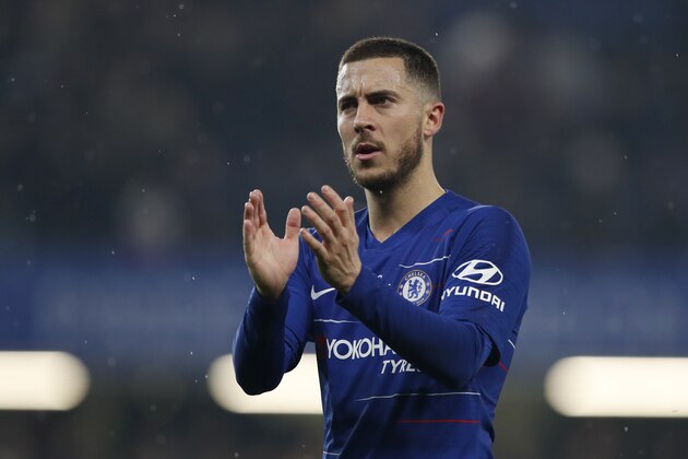 Chelsea's Eden Hazard applauds at the end of the English Premier League soccer match between Chelsea and West Ham at Stamford Bridge stadium in London, Monday, April 8, 2019. (AP Photo/Alastair Grant)