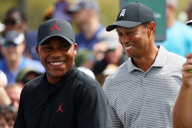 PONTE VEDRA BEACH, FLORIDA - MARCH 13:   Harold Varner III of the United States, Tiger Woods of the United States and Bryson DeChambeau of the United States look on during a practice round for The PLAYERS Championship on The Stadium Course at TPC Sawgrass on March 13, 2019 in Ponte Vedra Beach, Florida. (Photo by Gregory Shamus/Getty Images)