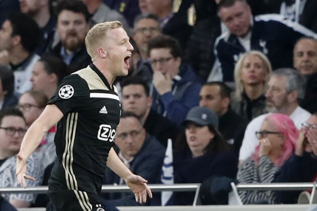 Ajax's Donny van de Beek celebrates scoring his side's first goal during the Champions League semifinal first leg soccer match between Tottenham Hotspur and Ajax at the Tottenham Hotspur stadium in London, Tuesday, April 30, 2019. (AP Photo/Frank Augstein)