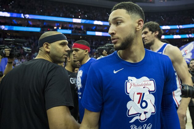 PHILADELPHIA, PA - APRIL 23: Ben Simmons #25 of the Philadelphia 76ers walks past Jared Dudley #6 of the Brooklyn Nets after Game Five of Round One of the 2019 NBA Playoffs at the Wells Fargo Center on April 23, 2019 in Philadelphia, Pennsylvania. The 76ers defeated the Nets 122-100. NOTE TO USER: User expressly acknowledges and agrees that, by downloading and or using this photograph, User is consenting to the terms and conditions of the Getty Images License Agreement. (Photo by Mitchell Leff/Getty Images)