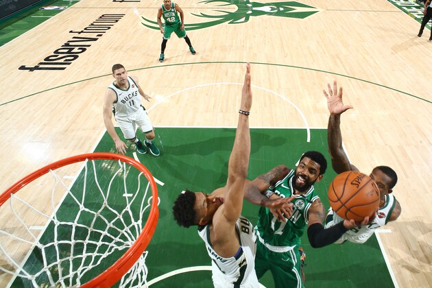 MILWAUKEE, WI - APRIL 30: Kyrie Irving #11 of the Boston Celtics shoots the ball against the Milwaukee Bucks during Game Two of the Eastern Conference Semi Finals of the 2019 NBA Playoffs on April 30, 2019 at the Fiserv Forum Center in Milwaukee, Wisconsin. NOTE TO USER: User expressly acknowledges and agrees that, by downloading and or using this Photograph, user is consenting to the terms and conditions of the Getty Images License Agreement. Mandatory Copyright Notice: Copyright 2019 NBAE (Photo by Nathaniel S. Butler/NBAE via Getty Images).
