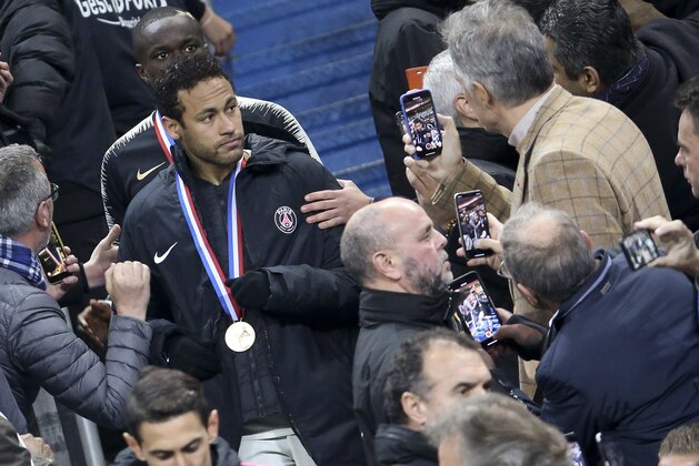 PARIS, FRANCE - APRIL 27: Neymar Jr of PSG looks on after grabbing his finalist's medal following the French Cup Final (Coupe de France) between Stade Rennais (Rennes) and Paris Saint-Germain (PSG) at Stade de France on April 27, 2019 in Saint-Denis near Paris, France. (Photo by Jean Catuffe/Getty Images)
