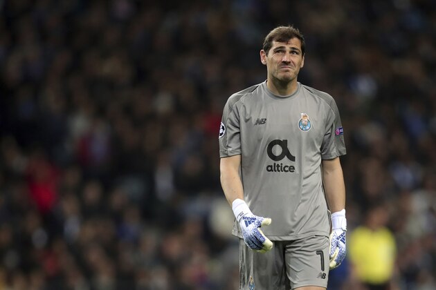 Porto goalkeeper Iker Casillas grimaces during the Champions League quarterfinals, 2nd leg, soccer match between FC Porto and Liverpool at the Dragao stadium in Porto, Portugal, Wednesday, April 17, 2019. (AP Photo/Luis Vieira)