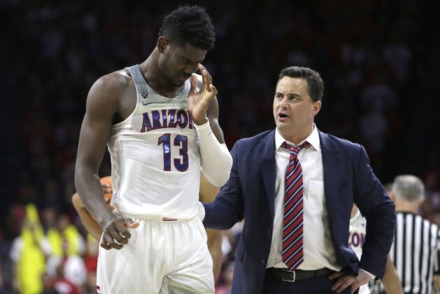Arizona forward Deandre Ayton (13) and Sean Miller in the first half during an NCAA college basketball game against Stanford, Thursday, March 1, 2018, in Tucson, Ariz. (AP Photo/Rick Scuteri)