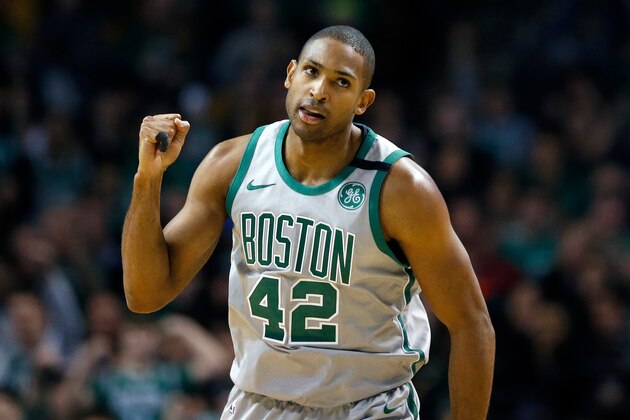 Boston Celtics' Al Horford reacts after scoring during the second quarter of an NBA basketball game against the Atlanta Hawks in Boston, Sunday, April 8, 2018. (AP Photo/Michael Dwyer)
