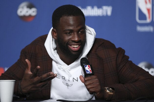 Golden State Warriors forward Draymond Green speaks during a news conference following Game 3 of basketball's NBA Finals, early Wednesday June 7, 2018, in Cleveland. The Warriors defeated the Cleveland Cavaliers 110-102 to take a 3-0 lead in the series. (AP Photo/Carlos Osorio)