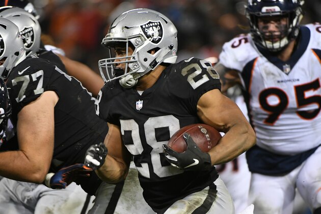 OAKLAND, CA - DECEMBER 24: Doug Martin #28 of the Oakland Raiders rushes with the ball against the Denver Broncos during their NFL game at Oakland-Alameda County Coliseum on December 24, 2018 in Oakland, California. (Photo by Robert Reiners/Getty Images)
