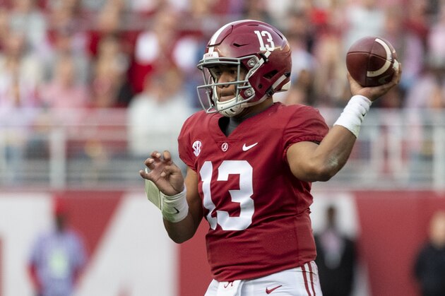 Alabama quarterback Tua Tagovailoa (13) drops back to pass against Auburn during the first half of an NCAA college football game, Saturday, Nov. 24, 2018, in Tuscaloosa, Ala. (AP Photo/Vasha Hunt)