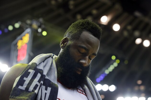 Houston Rockets' James Harden pauses during a break in action during the first half of Game 2 of a second-round NBA basketball playoff series against the Golden State Warriors in Oakland, Calif., Tuesday, April 30, 2019. (AP Photo/Jeff Chiu)