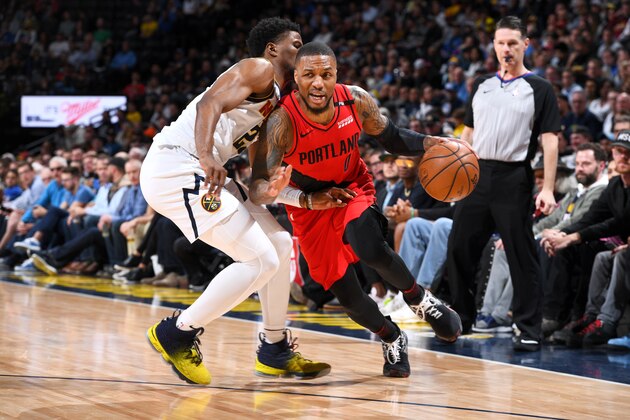 DENVER, CO - MAY 1: Damian Lillard #0 of the Portland Trail Blazers drives to the basket against the Denver Nuggets during Game Two of the Western Conference Semifinals of the 2019 NBA Playoffs on May 1, 2019 at the Pepsi Center in Denver, Colorado. NOTE TO USER: User expressly acknowledges and agrees that, by downloading and/or using this photograph, user is consenting to the terms and conditions of the Getty Images License Agreement. Mandatory Copyright Notice: Copyright 2019 NBAE (Photo by Garrett Ellwood/NBAE via Getty Images)