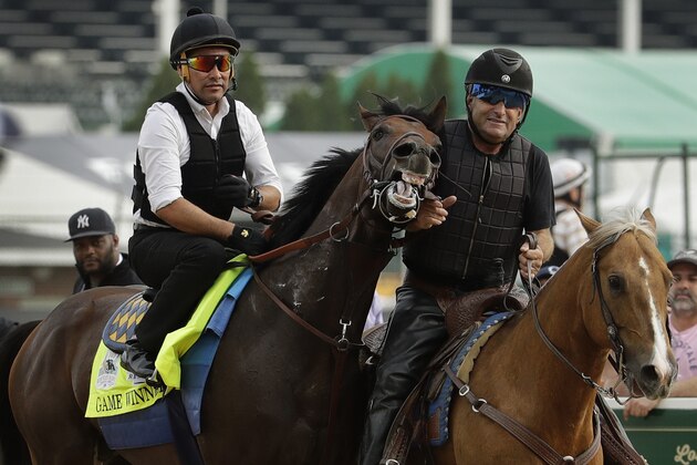 Kentucky Derby entrant Game Winner is led off the track after a workout at Churchill Downs Wednesday, May 1, 2019, in Louisville, Ky. The 145th running of the Kentucky Derby is scheduled for Saturday, May 4. (AP Photo/Charlie Riedel)