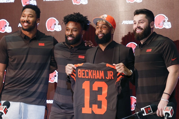 Cleveland Browns' Odell Beckham poses with his jersey along with Baker Mayfield, right, Myles Garrett, left, and Jarvis Landry during a news conference Monday, April 1, 2019, in Berea, Ohio. (AP Photo/Ron Schwane)