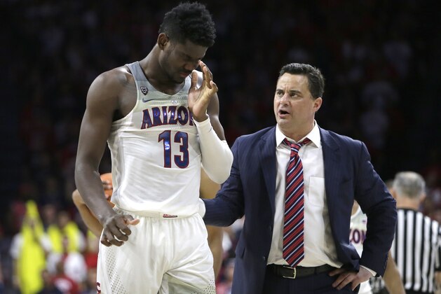Arizona forward Deandre Ayton (13) and Sean Miller in the first half during an NCAA college basketball game against Stanford, Thursday, March 1, 2018, in Tucson, Ariz. (AP Photo/Rick Scuteri)