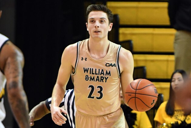 TOWSON, MD - FEBRUARY 28:  Justin Pierce #23 of the William & Mary Tribe dribbles the ball up court during a college basketball game against the Towson Tigers at the SECU Arena on February 28, 2019 in College Park, Maryland.  (Photo by Mitchell Layton/Getty Images)
