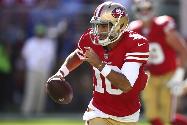 FILE - In this Sept. 16, 2018, file photo, San Francisco 49ers quarterback Jimmy Garoppolo runs with the ball during the second half of an NFL football game against the Detroit Lions in Santa Clara, Calif. Garoppolo was perfect in five starts to finish last season, and while he’s had trouble with interceptions the first two weeks, he's also a big reason why San Francisco won a shootout against the Lions last week. Garoppolo threw a pair of touchdown passes in the 30-27 victory. The 49ers play the Kansas City Chiefs this week. (AP Photo/Ben Margot, File)