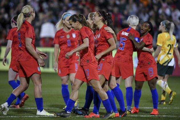 COMMERCE CITY, CO - APRIL 4: United States Women's National Team players celebrate with Alex Morgan #13 after Morgan scored her 100th international goal against Australia at Dick's Sporting Goods Park on April 4, 2019 in Commerce City, Colorado. (Photo by Michael Ciaglo/Getty Images)
