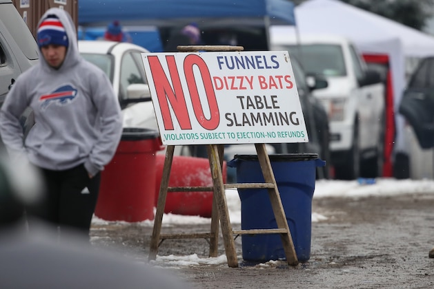 BUFFALO, NY - DECEMBER 30: A sign notes the prohibition of table slamming and other activities as fans of the Buffalo Bills gather for tailgating activities prior to the Bills NFL game against the Miami Dolphins at New Era Field on December 30, 2018 in Buffalo, New York. (Photo by Tom Szczerbowski/Getty Images) *** Local Caption ***