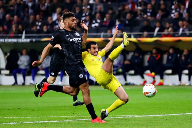 FRANKFURT AM MAIN, GERMANY - MAY 02: Pedro of Chelsea attempts a shot as he is challenged by Simon Falette of Eintracht Frankfurt during the UEFA Europa League Semi Final First Leg match between Eintracht Frankfurt and Chelsea at Commerzbank-Arena on May 02, 2019 in Frankfurt am Main, Germany. (Photo by Chris Brunskill/Fantasista/Getty Images)