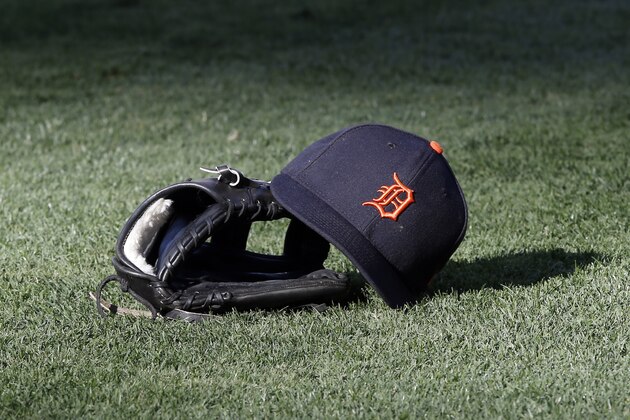 Detroit Tigers hat and glove waits for a player during warm ups before a baseball game against the Los Angeles Angels in Anaheim, Calif., Friday, May 12, 2017. (AP Photo/Alex Gallardo)