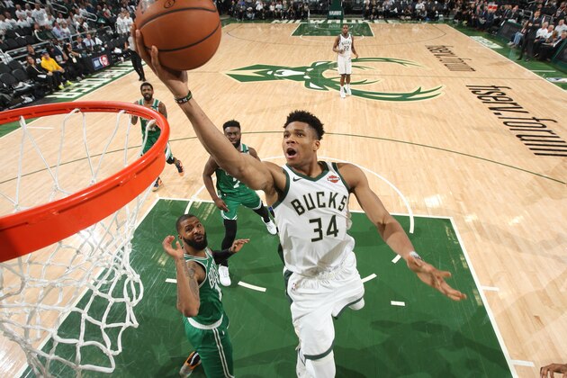MILWAUKEE, WI - APRIL 30: Giannis Antetokounmpo #34 of the Milwaukee Bucks goes to the basket against the Boston Celtics  during Game Two of the Eastern Conference Semifinals of the 2019 NBA Playoffs on April 30, 2019 at the Fiserv Forum Center in Milwaukee, Wisconsin. NOTE TO USER: User expressly acknowledges and agrees that, by downloading and or using this Photograph, user is consenting to the terms and conditions of the Getty Images License Agreement. Mandatory Copyright Notice: Copyright 2019 NBAE (Photo by Gary Dineen/NBAE via Getty Images).