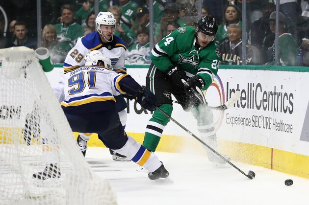 DALLAS, TEXAS - MAY 01:  Roope Hintz #24 of the Dallas Stars skates the puck against Vladimir Tarasenko #91 of the St. Louis Blues during the third period of Game Four of the Western Conference Second Round of the 2019 NHL Stanley Cup Playoffs at American Airlines Center on May 1, 2019 in Dallas, Texas. (Photo by Ronald Martinez/Getty Images)