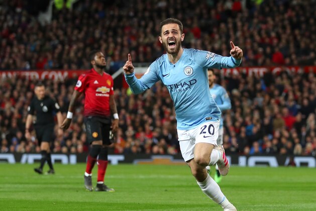 MANCHESTER, ENGLAND - APRIL 24: Bernardo Silva of Manchester City celebrates after scoring his team's first goal during the Premier League match between Manchester United and Manchester City at Old Trafford on April 24, 2019 in Manchester, United Kingdom. (Photo by Catherine Ivill/Getty Images)