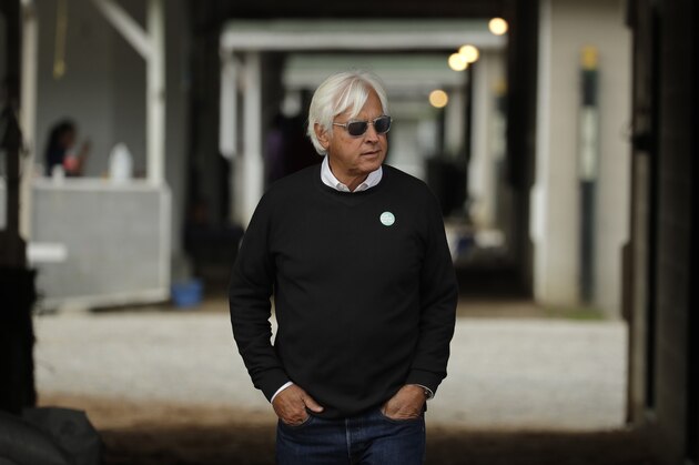 Trainer Bob Baffert looks out from his barn before a workout at Churchill Downs Wednesday, May 1, 2019, in Louisville, Ky. (AP Photo/Charlie Riedel, File)