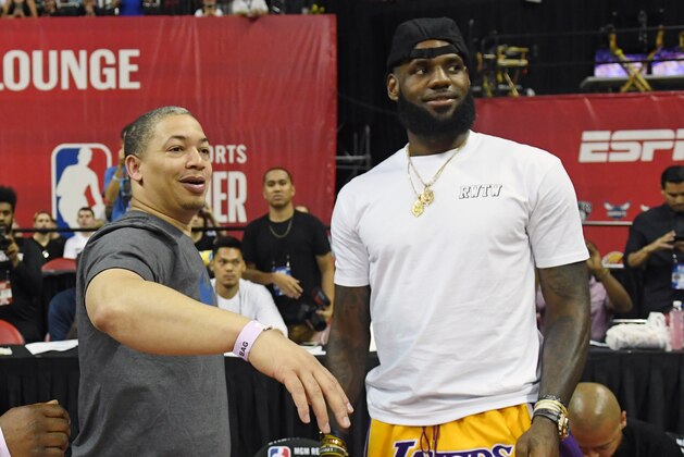 LAS VEGAS, NV - JULY 15:  Head coach Tyronn Lue (L) of the Cleveland Cavaliers talks with LeBron James of the Los Angeles Lakers after a quarterfinal game of the 2018 NBA Summer League between the Lakers and the Detroit Pistons at the Thomas & Mack Center on July 15, 2018 in Las Vegas, Nevada. NOTE TO USER: User expressly acknowledges and agrees that, by downloading and or using this photograph, User is consenting to the terms and conditions of the Getty Images License Agreement.  (Photo by Ethan Miller/Getty Images)