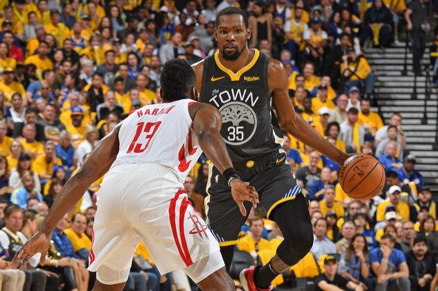 OAKLAND, CA - APRIL 30: Kevin Durant #35 of the Golden State Warriors looks to make a play against the Houston Rockets during Game Two of the Western Conference Semi-Finals of the 2019 NBA Playoffs on April 30, 2019 at ORACLE Arena in Oakland, California. NOTE TO USER: User expressly acknowledges and agrees that, by downloading and or using this photograph, user is consenting to the terms and conditions of Getty Images License Agreement. Mandatory Copyright Notice: Copyright 2019 NBAE (Photo by Andrew D. Bernstein/NBAE via Getty Images)