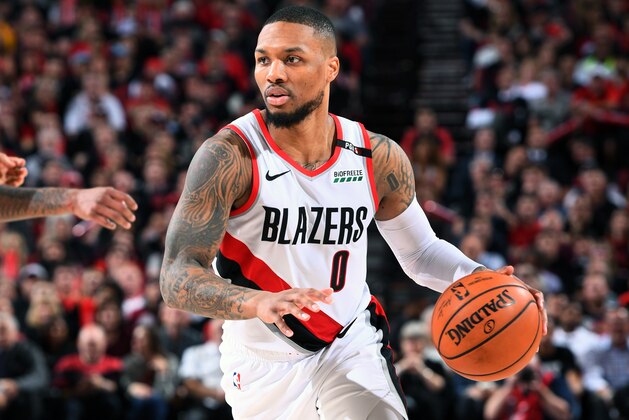 PORTLAND, OR - MAY 3: Damian Lillard #0 of the Portland Trail Blazers handles the ball against the Denver Nuggets during Game Three of the Western Conference Semifinals of the 2019 NBA Playoffs on May 3, 2019 at the Moda Center Arena in Portland, Oregon. NOTE TO USER: User expressly acknowledges and agrees that, by downloading and/or using this photograph, user is consenting to the terms and conditions of the Getty Images License Agreement. Mandatory Copyright Notice: Copyright 2019 NBAE (Photo by Garrett Ellwood/NBAE via Getty Images)