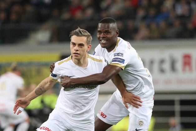 GENT, BELGIUM - APRIL 27: Leandro Trossard of Genk celebrates with Ally Samatta of Genk after scoring a goal during the Jupiler Pro League play-off 1 match (day 6) between Kaa Gent and Krc Genk at Ghelamco Arena on April 27, 2019 in Gent, Belgium. (Photo by Vincent Van Doornick/Isosport/MB Media/Getty Images)