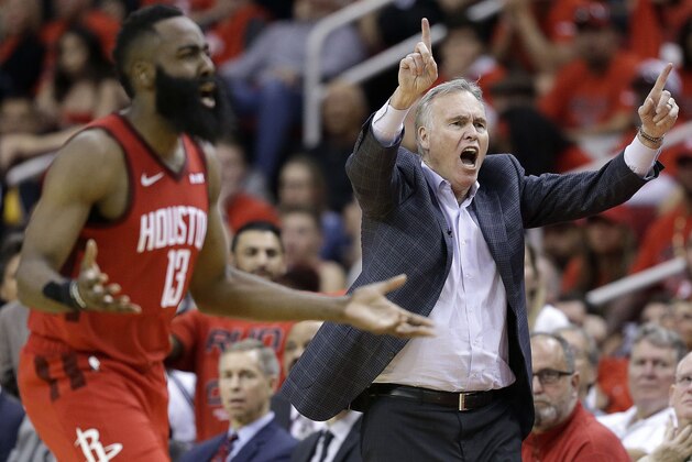 Houston Rockets head coach Mike D'Antoni, right, reacts to a call during the second half of Game 1 of an NBA basketball first-round playoff series against the Utah Jazz, Sunday, April 14, 2019, in Houston. Houston won the game 122-90. (AP Photo/Eric Christian Smith)