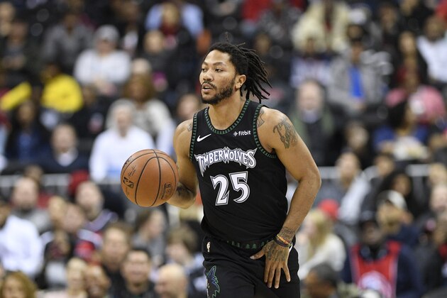 Minnesota Timberwolves guard Derrick Rose (25) dribbles the ball during the first half of an NBA basketball game against the Washington Wizards, Sunday, March 3, 2019, in Washington. (AP Photo/Nick Wass)
